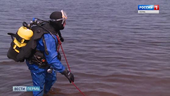 Под водой и под дождем: первый краевой конкурс спасателей-водолазов